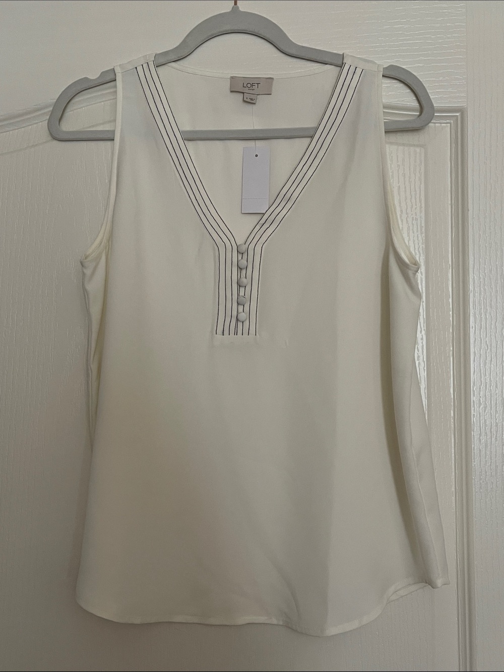 LOFT Cream V-Neck sheer Sleeveless Shell with Button Placket
